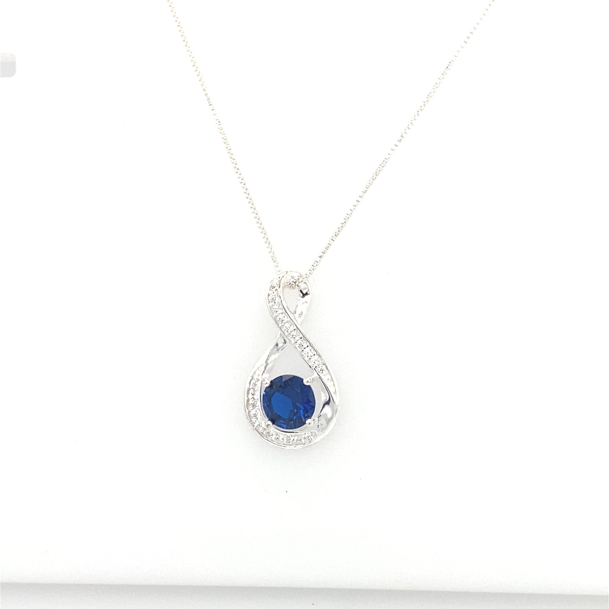 Sterling Silver Pendant with Blue Stone