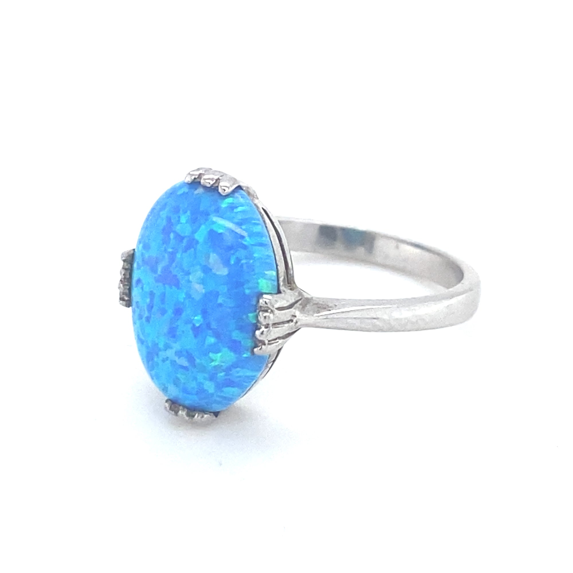 Sterling Silver Ring with the most Vibrant Blue Opal Style Stone