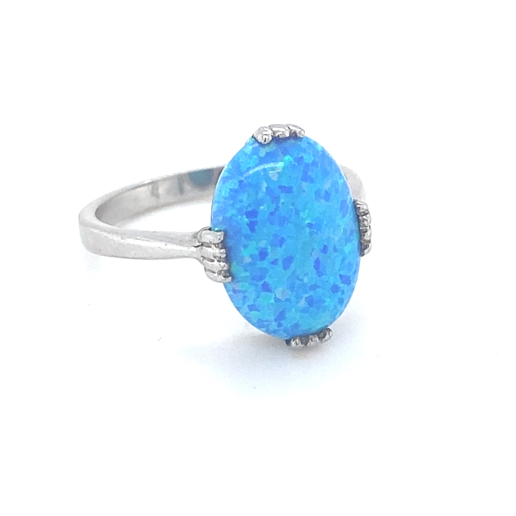 Sterling Silver Ring with the most Vibrant Blue Opal Style Stone