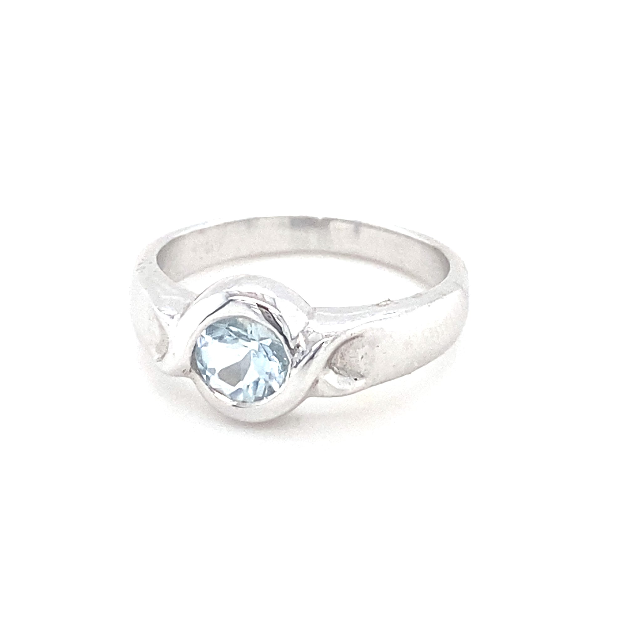 9kt White Gold Ring with Aqua Marine Coloured Stone