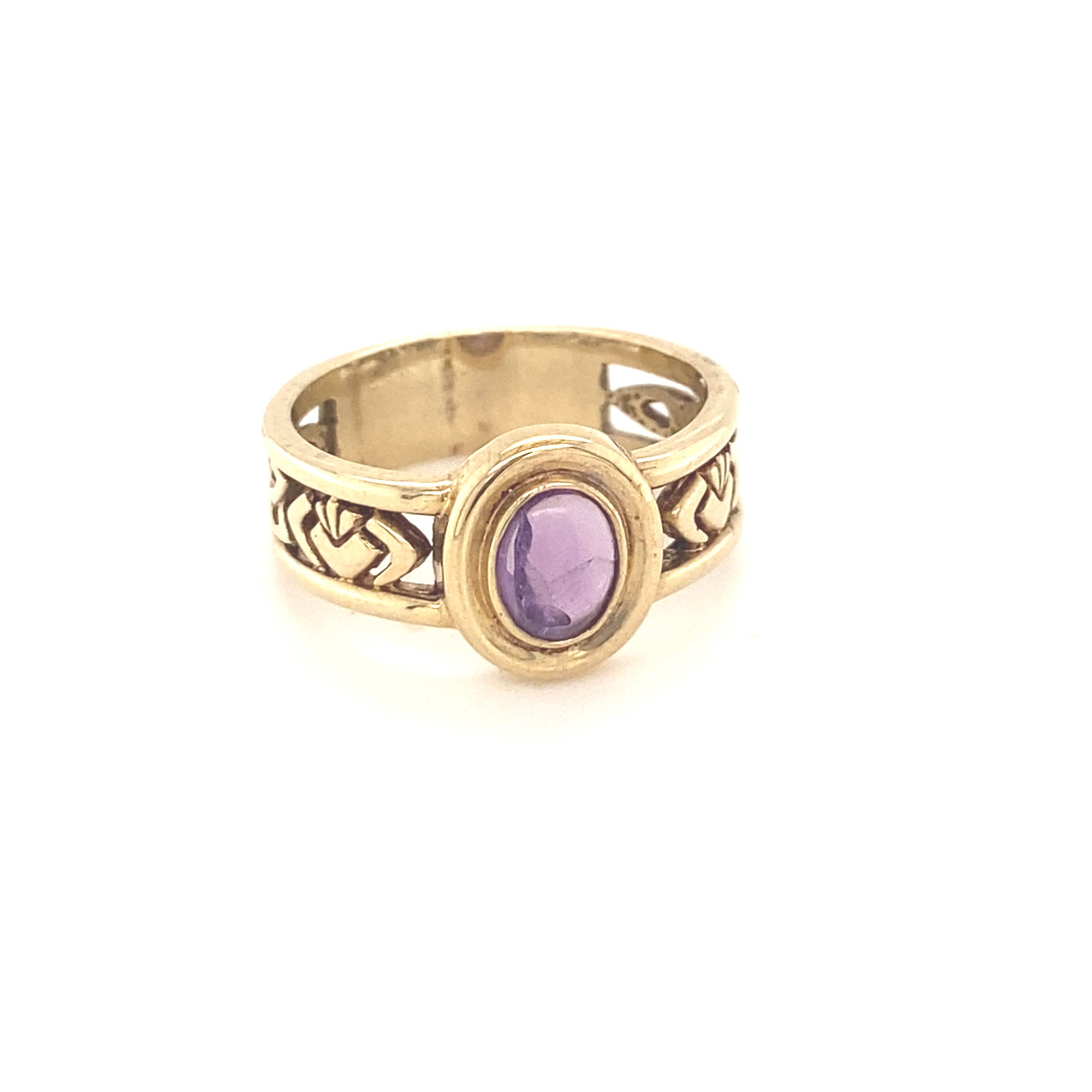 Gold Celtic Band with a Amethyst Stone