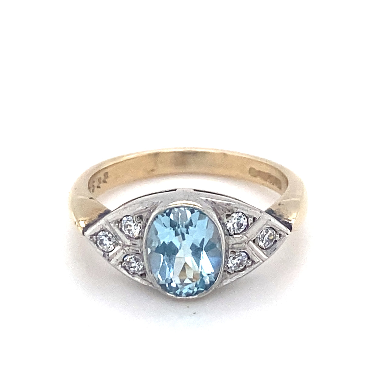 9kt Gold Vintage Ring wit Diamonds and Light Blue Stone