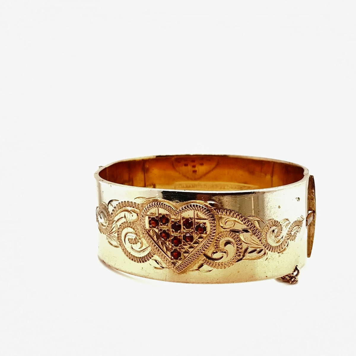 Wide Vintage Bangle with Hand Engraved Design around the Garnet stones