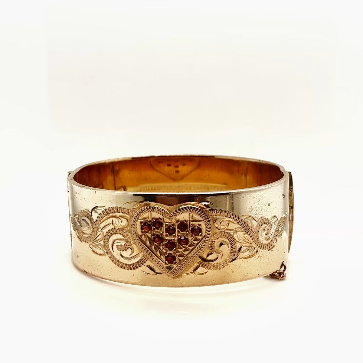 Wide Vintage Bangle with Hand Engraved Design around the Garnet stones