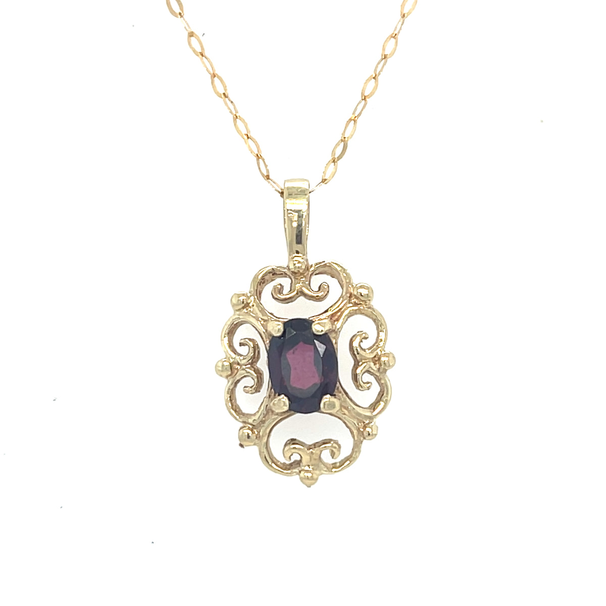 9kt Gold Pendant with garnet stone