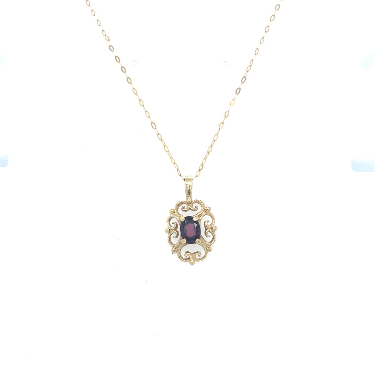 9kt Gold Pendant with garnet stone