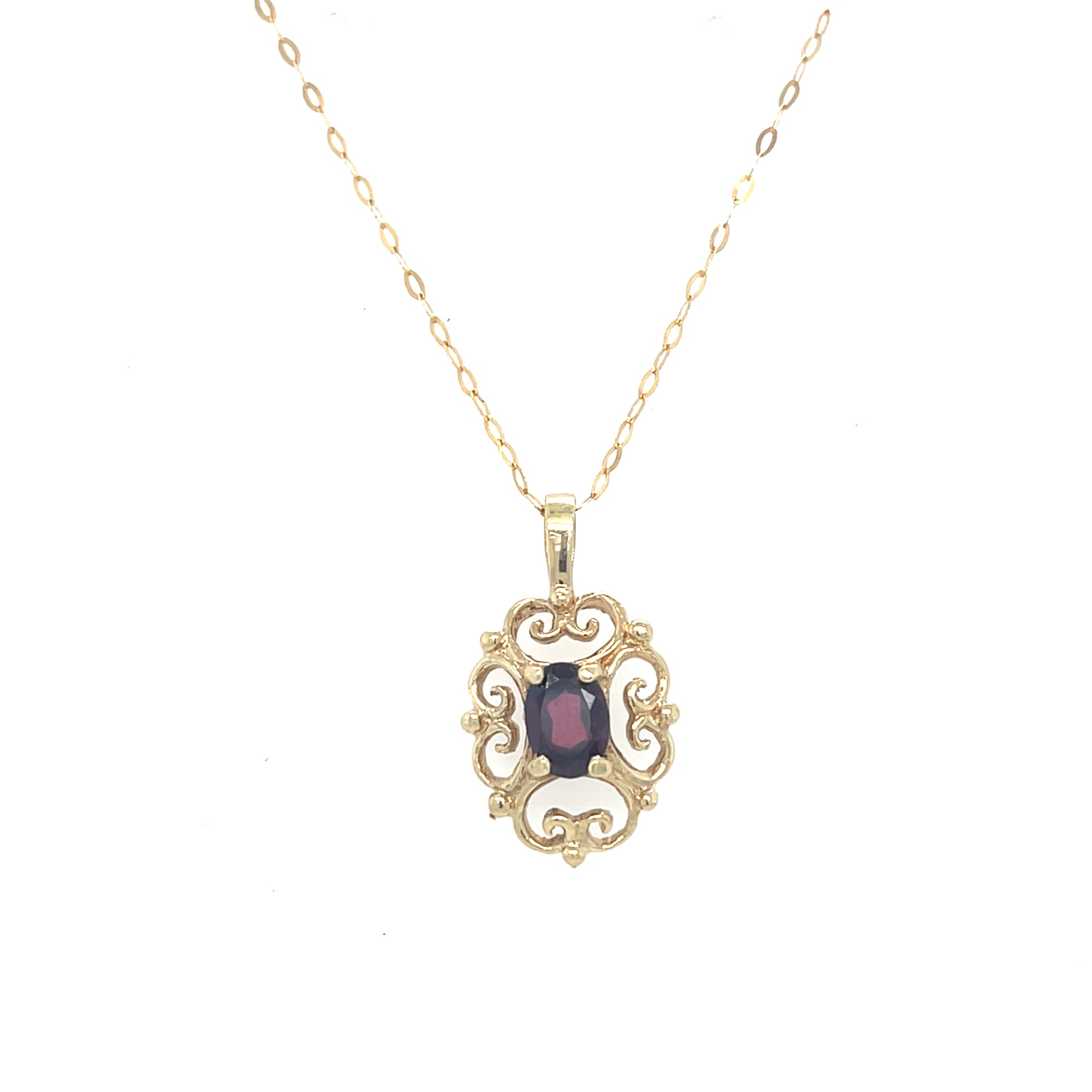 9kt Gold Pendant with garnet stone