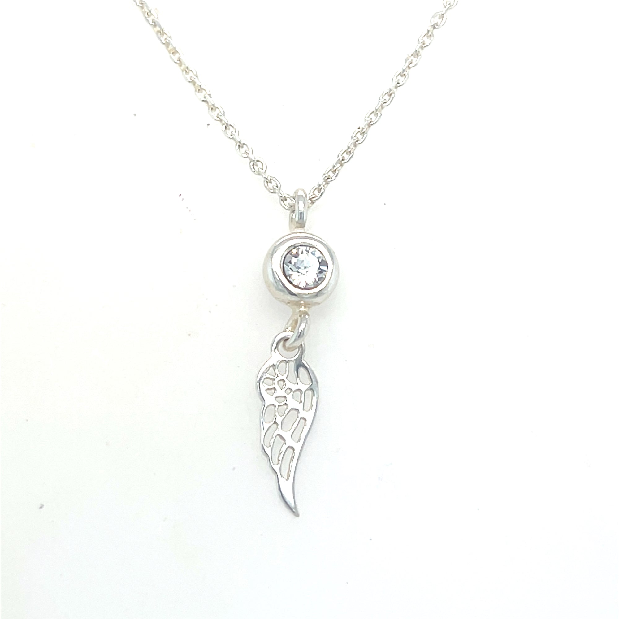 Sterling silver angel wing and clear stone pendant