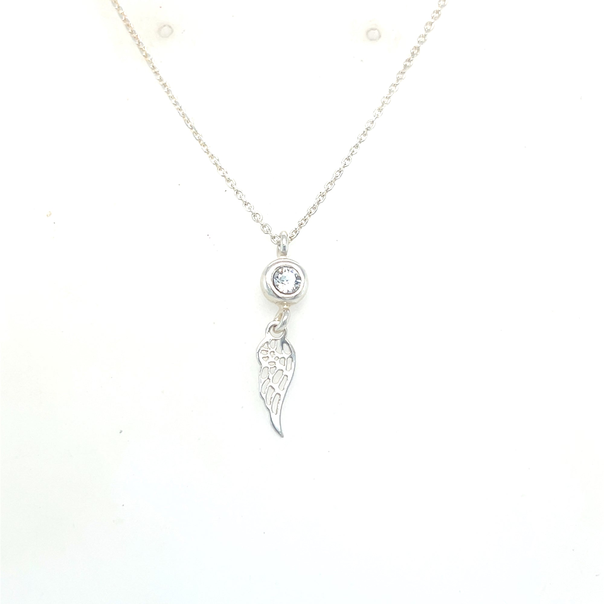 Sterling silver angel wing and clear stone pendant