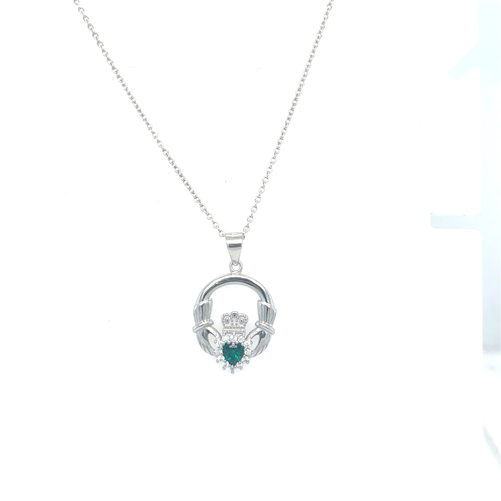 Sterling silver claddagh pendant with green stone