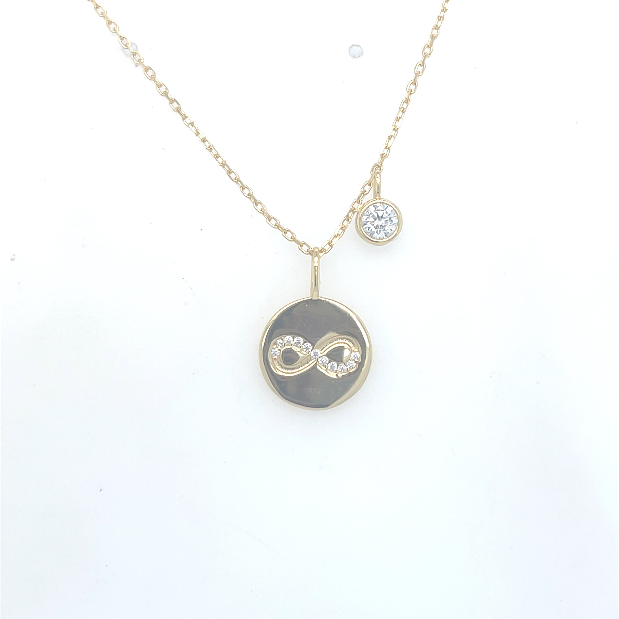 Gold Plated Infinity Disc and Clear Stone Pendant