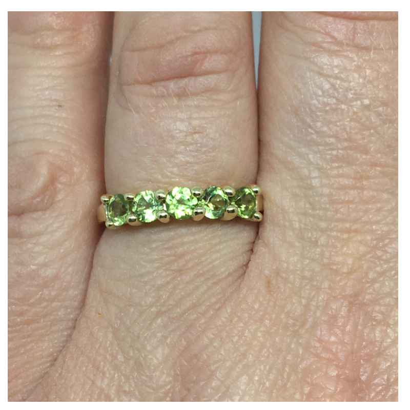 9kt Gold Ring with Peridot Coloured Stones