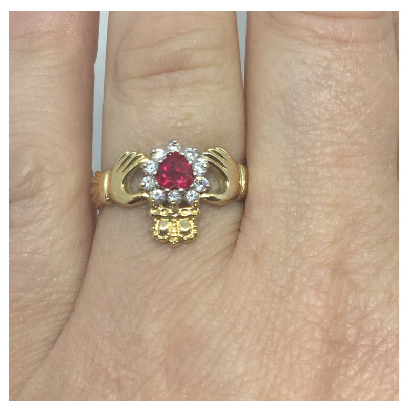Gold Claddagh Ring with Ruby coloured stone in centre