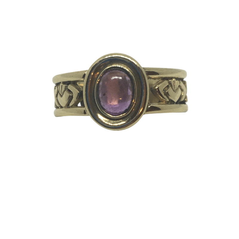 Gold Celtic Band with a Amethyst Stone