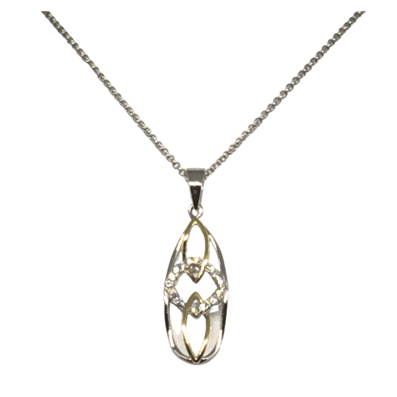 Silver oval pendant with a touch of gold and sparkle