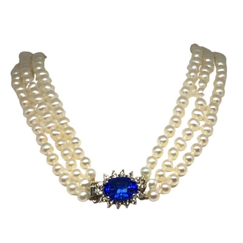 Three Rows of Cultured Pearls with a Centre Blue Stone