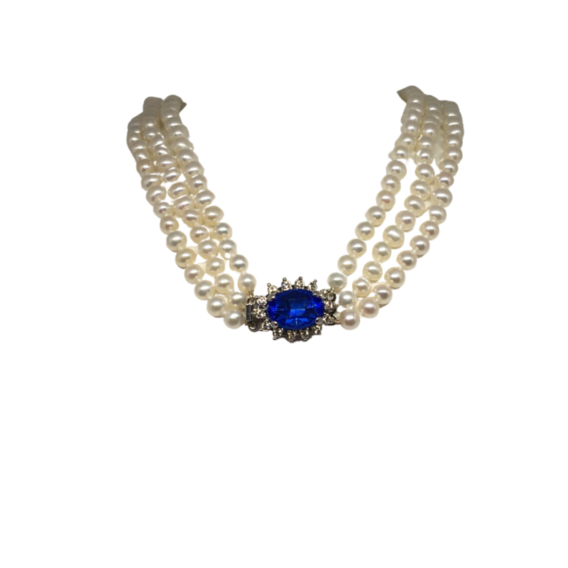 Three Rows of Cultured Pearls with a Centre Blue Stone