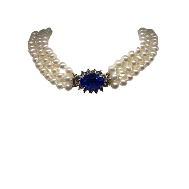 Three Rows of Cultured Pearls with a Centre Blue Stone