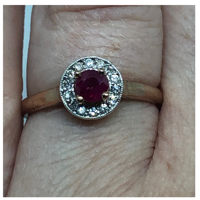 Gold ring deals with ruby stone