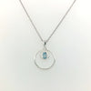 Sterling Silver Circle Pendant with Light Blue Stone