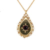 9kt Gold Pear Shaped Pendant with Centre Garnet Stone