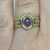 Gold Celtic Band with a Amethyst Stone