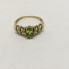 Gold Ring with five Peridot colour Stones